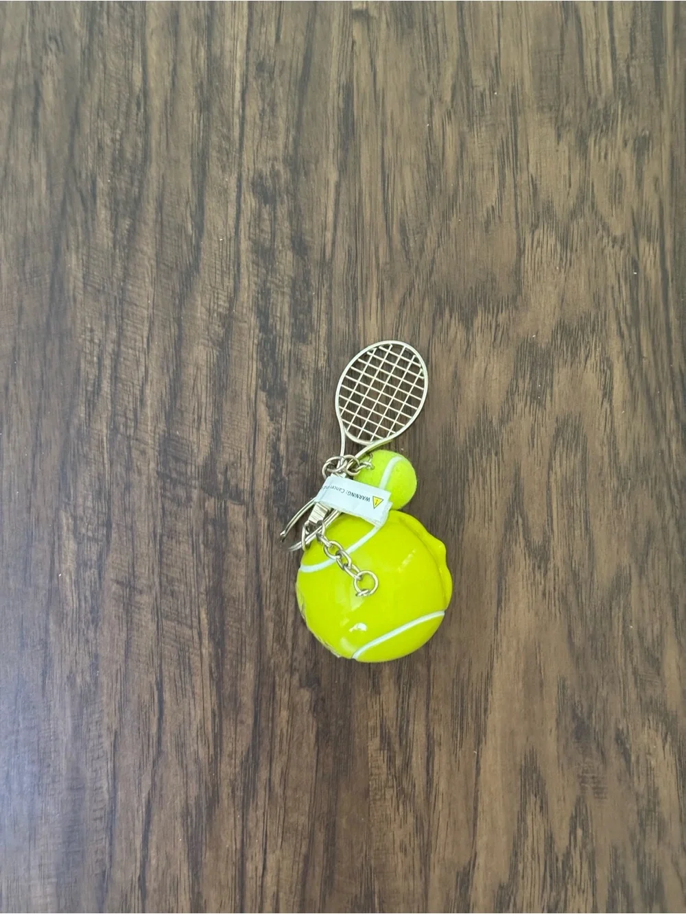 Urban outfitters Tennis Ball & Racket Keychain - Neon Yellow